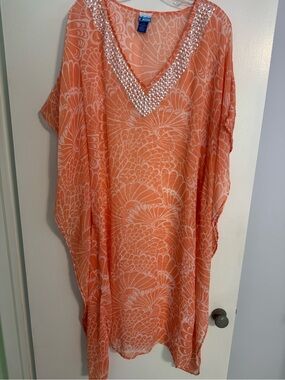 Soaked orange and white cover. L/XL